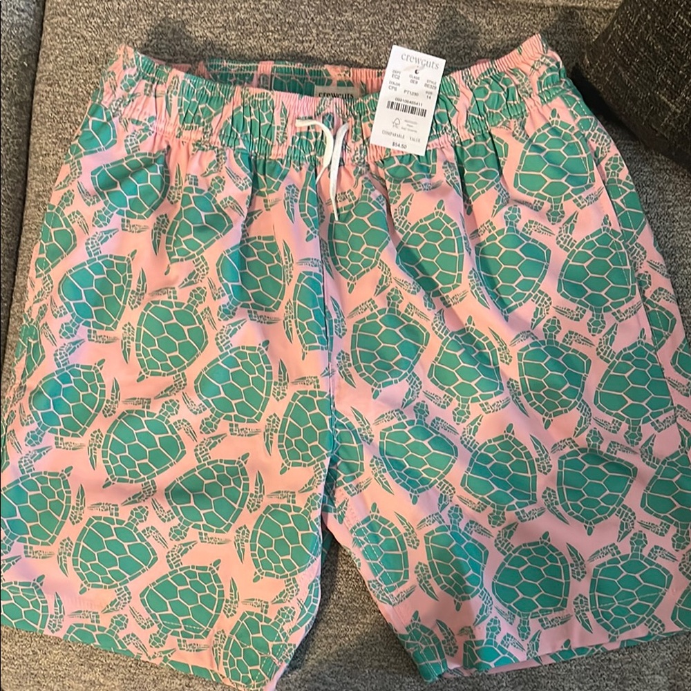 Crewcuts Kids Swim Trunks in Pink and Green Turtle Print